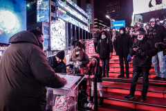 People came to the red steps of Times Square for a Vow Renewal Ceremony, put together by the The Times Square Alliance’s “ Love In Times Square” event on Valentine’s Day in NYC.Comedian Zarna Gargone one of the performers from the My Funny Valentine show at Carolines on Broadway; and a romantic performance of "All I Ask of You" by Julia Udine and Paul A. Schaefer from Broadway's Phantom of the Opera performed. ©Bianca Otero