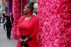 Visitors pose with the multitude of flowers both inside and outside the Macy's Department Store during the annual Macy's Flower Show on 34th Street and Broadway in New York City on March 27, 2022. (Photo by Andrew Schwartz)
