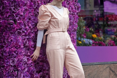 Visitors pose with the multitude of flowers both inside and outside the Macy's Department Store during the annual Macy's Flower Show on 34th Street and Broadway in New York City on March 27, 2022. (Photo by Andrew Schwartz)