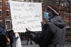 Protesters gather at Washington Square Park to demand the resignation of New York Governor Andrew Cuomo  in New York City. This man was one of a few who held up a sign which said innocent until proven guilty. The demands for Governor Cuomo's resignation are in response to the sexual harassment allegations made by numerous women and a cover-up preventable of coronavirus (COVID-19) deaths in nursing homes on 20 March 2021