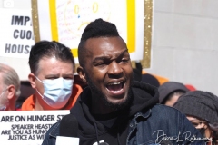 Cuomo accuser Lindsey Boylan speaks at the March to Impeach Cuomo and #TaxTheRich! in Washington Square Park in New York City on 20 March 2021