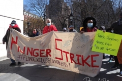 Protesters gather at Washington Square Park to demand the resignation of New York Governor Andrew Cuomo on March 20, 2021 in New York City. The demands for Governor Cuomo's resignation are in response to the sexual harassment allegations made by numerous women and a cover-up preventable of coronavirus (COVID-19) deaths in nursing homes.