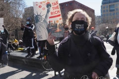 Protesters gather at Washington Square Park to demand the resignation of New York Governor Andrew Cuomo on March 20, 2021 in New York City. The demands for Governor Cuomo's resignation are in response to the sexual harassment allegations made by numerous women and a cover-up preventable of coronavirus (COVID-19) deaths in nursing homes.