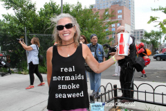 June 15,2022    NEW YORK  
The 40th Annual Mermaid Parade. returned after a two year absence due to Covid. Revelers Dance in the streets while groups of of musicians / bands play while marching along the parade route