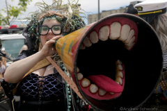 Dressed in all types of costumes, some with and some without an aquatic theme, parade goers both young and old participate in the 40th Annual Coney Island Mermaid Parade in Brooklyn NY on June 18, 2020. (Photo by Andrew Schwartz)