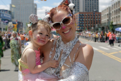 Dressed in all types of costumes, some with and some without an aquatic theme, parade goers both young and old participate in the 40th Annual Coney Island Mermaid Parade in Brooklyn NY on June 18, 2020. (Photo by Andrew Schwartz)