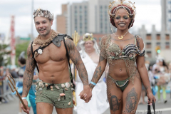 Dressed in all types of costumes, some with and some without an aquatic theme, parade goers both young and old participate in the 40th Annual Coney Island Mermaid Parade in Brooklyn NY on June 18, 2020. (Photo by Andrew Schwartz)