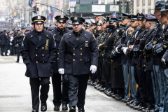 Police Officer Wilbert Mora was laid to rest 2/2/22 after being posthumously promoted to Detective First Grade, and eulogized at St. PatrickÕs Cathedral. Thousands of police from all parts of the country lined Fifth Ave. as the procession carrying Detective Mora passed.  Mora was gunned down along with his partner Jason Rivera, who passed away a few days earlier.