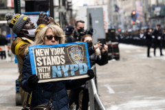 Police Officer Wilbert Mora was laid to rest 2/2/22 after being posthumously promoted to Detective First Grade, and eulogized at St. PatrickÕs Cathedral. Thousands of police from all parts of the country lined Fifth Ave. as the procession carrying Detective Mora passed.  Mora was gunned down along with his partner Jason Rivera, who passed away a few days earlier.