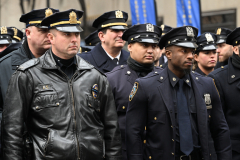 Police Officer Wilbert Mora was laid to rest 2/2/22 after being posthumously promoted to Detective First Grade, and eulogized at St. PatrickÕs Cathedral. Thousands of police from all parts of the country lined Fifth Ave. as the procession carrying Detective Mora passed.  Mora was gunned down along with his partner Jason Rivera, who passed away a few days earlier.