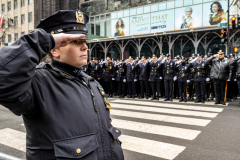Police Officer Wilbert Mora was laid to rest 2/2/22 after being posthumously promoted to Detective First Grade, and eulogized at St. PatrickÕs Cathedral. Thousands of police from all parts of the country lined Fifth Ave. as the procession carrying Detective Mora passed.  Mora was gunned down along with his partner Jason Rivera, who passed away a few days earlier.