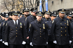 Police Officer Wilbert Mora was laid to rest 2/2/22 after being posthumously promoted to Detective First Grade, and eulogized at St. PatrickÕs Cathedral. Thousands of police from all parts of the country lined Fifth Ave. as the procession carrying Detective Mora passed.  Mora was gunned down along with his partner Jason Rivera, who passed away a few days earlier.