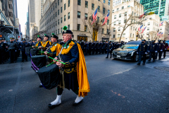 Police Officer Wilbert Mora was laid to rest 2/2/22 after being posthumously promoted to Detective First Grade, and eulogized at St. PatrickÕs Cathedral. Thousands of police from all parts of the country lined Fifth Ave. as the procession carrying Detective Mora passed.  Mora was gunned down along with his partner Jason Rivera, who passed away a few days earlier.