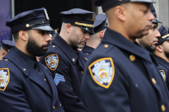 Police officers gather outside ot St. Particks Cathedral to honor Police officer, Wilbert Mora, who was fatally shot during a call of a domestic dispute in Harlem on January 21, 2022, Feb. 2, 2022.