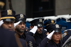 Police officers gather outside ot St. Particks Cathedral to honor Police officer, Wilbert Mora, who was fatally shot during a call of a domestic dispute in Harlem on January 21, 2022, Feb. 2, 2022.