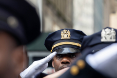 Police officers gather outside ot St. Particks Cathedral to honor Police officer, Wilbert Mora, who was fatally shot during a call of a domestic dispute in Harlem on January 21, 2022, Feb. 2, 2022.