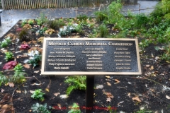 Mother Cabrini Statue at Battery Park South Cove location NYC. A rainy and foggy day. I even photographed a water spout on the Hudson River. It lasted less than a minute then disappeared.
