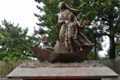 Mother Cabrini Statue at Battery Park South Cove location NYC. A rainy and foggy day. I even photographed a water spout on the Hudson River. It lasted less than a minute then disappeared.