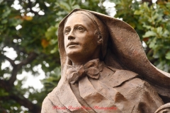 Mother Cabrini Statue at Battery Park South Cove location NYC. A rainy and foggy day. I even photographed a water spout on the Hudson River. It lasted less than a minute then disappeared.