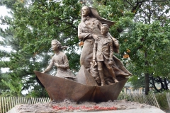 Mother Cabrini Statue at Battery Park South Cove location NYC. A rainy and foggy day. I even photographed a water spout on the Hudson River. It lasted less than a minute then disappeared.