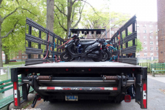 May 12, 2022  NYC Police Officers from Police Service Area 1 confiscate motorcycles and scooters that are illegally store/parked on New York City Housing Authority Property. Sgt. Khalid and his team of officers with the help of NYC Traffic Department personnel load a flatbed truck with illegal motorcycles.