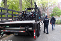 May 12, 2022  NYC Police Officers from Police Service Area 1 confiscate motorcycles and scooters that are illegally store/parked on New York City Housing Authority Property. Sgt. Khalid and his team of officers with the help of NYC Traffic Department personnel load a flatbed truck with illegal motorcycles.