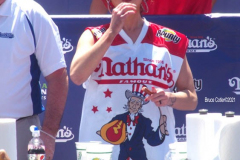 NATHAN’S FAMOUS FOURTH OF JULY HOT DOG-EATING CONTEST
 AT CONEY ISLAND’S MAIMONIDES PARK

World champion Joey Chestnut will defend his title against the world’s top eaters before a live audience at the Nathan’s Famous Fourth of July International Hot Dog-Eating Contest in Coney Island’s Maimonides Park (formerly MCU Park). 

The world’s best eating athletes  go head-to-head in the 10-minute, all-you-can-eat contest. Chestnut’s  broke his world record of 75 hot dogs and buns with 76 hot dogs. against number-two-ranked Geoffrey Esper(who has beaten Chestnut in recent events) .

In the women’s competition, Michelle Lesco won with 30 3/4hot dogs and buns  competed against world pepperoni roll-eating champion Larell Marie Mele and Sarah Rodriguez.