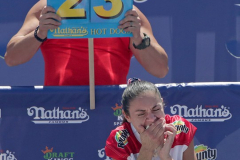 Competitive eater Michelle Lesco competes in the Nathan’s Fourth of July Hot Dog Eating Contest in Coney Island Brooklyn NY on July 4, 2021. Lesco would go on to win contest for the first time by eating 30.75 dogs and buns in 10 minutes. (Photo by Andrew Schwartz)