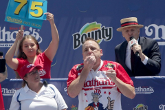 Competitive eater Joey Chestnut competes in the Nathan’s Fourth of July Hot Dog Eating Contest in Coney Island Brooklyn NY on July 4, 2021. Chestnut would go on to win contest by eating 76 dogs and buns.  (Photo by Andrew Schwartz)