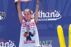 Woman's hot dog eating champion Michelle Lesco during the 2021 Nathans Famous Fourth of July International Hot Dog Eating Contest at Coney Island on 04 July 2021 in New York City.