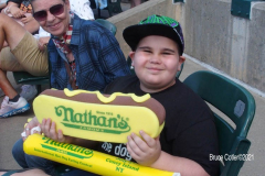 NATHAN’S FAMOUS FOURTH OF JULY HOT DOG-EATING CONTEST
 AT CONEY ISLAND’S MAIMONIDES PARK

World champion Joey Chestnut will defend his title against the world’s top eaters before a live audience at the Nathan’s Famous Fourth of July International Hot Dog-Eating Contest in Coney Island’s Maimonides Park (formerly MCU Park). 

The world’s best eating athletes  go head-to-head in the 10-minute, all-you-can-eat contest. Chestnut’s  broke his world record of 75 hot dogs and buns with 76 hot dogs. against number-two-ranked Geoffrey Esper(who has beaten Chestnut in recent events) .

In the women’s competition, Michelle Lesco won with 30 3/4hot dogs and buns  competed against world pepperoni roll-eating champion Larell Marie Mele and Sarah Rodriguez.