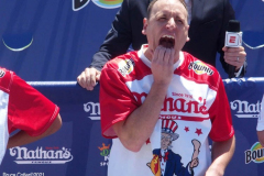 NATHAN’S FAMOUS FOURTH OF JULY HOT DOG-EATING CONTEST
 AT CONEY ISLAND’S MAIMONIDES PARK

World champion Joey Chestnut will defend his title against the world’s top eaters before a live audience at the Nathan’s Famous Fourth of July International Hot Dog-Eating Contest in Coney Island’s Maimonides Park (formerly MCU Park). 

The world’s best eating athletes  go head-to-head in the 10-minute, all-you-can-eat contest. Chestnut’s  broke his world record of 75 hot dogs and buns with 76 hot dogs. against number-two-ranked Geoffrey Esper(who has beaten Chestnut in recent events) .

In the women’s competition, Michelle Lesco won with 30 3/4hot dogs and buns  competed against world pepperoni roll-eating champion Larell Marie Mele and Sarah Rodriguez.