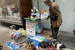 Noah The Animal Lover
He lives in NYC, retired and owns all those animals.  They are his pets.  He goes around throughout NYC and puts them on display for people to see and children to enjoy.  Petting is allowed.  All the animals are trained and 
non aggressive.  He collects voluntary donations to pay for food and associated vet cost.  His name is Noah.