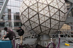December 27, 2021  New York , Workers Install 192 New Waterford Crystals
On Times Squares New Year’s Eve Ball.The Waterford Crystal New Year’s Eve Ball is a geodesic sphere, 12 feet in diameter, and weighs 11,875 pounds. The Ball is covered with a total of 2,688 Waterford Crystal triangles that vary in size, and range in length from 4 3/4 inches to 5 3/4 inches per side. For Times Square 2022,