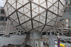 December 27, 2021  New York , Workers Install 192 New Waterford Crystals
On Times Squares New Year’s Eve Ball.The Waterford Crystal New Year’s Eve Ball is a geodesic sphere, 12 feet in diameter, and weighs 11,875 pounds. The Ball is covered with a total of 2,688 Waterford Crystal triangles that vary in size, and range in length from 4 3/4 inches to 5 3/4 inches per side. For Times Square 2022,