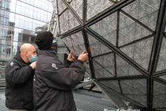December 27, 2021  New York , Workers Install 192 New Waterford Crystals
On Times Squares New Year’s Eve Ball.The Waterford Crystal New Year’s Eve Ball is a geodesic sphere, 12 feet in diameter, and weighs 11,875 pounds. The Ball is covered with a total of 2,688 Waterford Crystal triangles that vary in size, and range in length from 4 3/4 inches to 5 3/4 inches per side. For Times Square 2022,