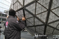December 27, 2021  New York , Workers Install 192 New Waterford Crystals
On Times Squares New Year’s Eve Ball.The Waterford Crystal New Year’s Eve Ball is a geodesic sphere, 12 feet in diameter, and weighs 11,875 pounds. The Ball is covered with a total of 2,688 Waterford Crystal triangles that vary in size, and range in length from 4 3/4 inches to 5 3/4 inches per side. For Times Square 2022,