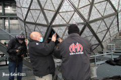 December 27, 2021  New York , Workers Install 192 New Waterford Crystals
On Times Squares New Year’s Eve Ball.The Waterford Crystal New Year’s Eve Ball is a geodesic sphere, 12 feet in diameter, and weighs 11,875 pounds. The Ball is covered with a total of 2,688 Waterford Crystal triangles that vary in size, and range in length from 4 3/4 inches to 5 3/4 inches per side. For Times Square 2022,