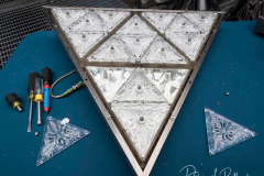 Workers install Waterford Crystal triangles on the Times Square New Year's Eve Ball on December 27, 2021 in New York.