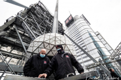 Workers install Waterford Crystal triangles on the Times Square New Year's Eve Ball on December 27, 2021 in New York.