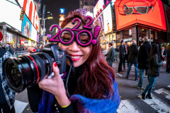 Revelers celebrate the New Year in Times Square 1/1/22.  Although the crowds were smaller, 15,000 instead of 58,000, it appeared to be a very crowded celebration.