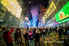 Revelers celebrate the New Year in Times Square 1/1/22.  Although the crowds were smaller, 15,000 instead of 58,000, it appeared to be a very crowded celebration.