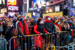 Revelers celebrate the New Year in Times Square 1/1/22.  Although the crowds were smaller, 15,000 instead of 58,000, it appeared to be a very crowded celebration.
