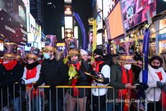 Revelers celebrate the New Year in Times Square 1/1/22.  Although the crowds were smaller, 15,000 instead of 58,000, it appeared to be a very crowded celebration.