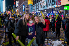 Revelers celebrate the New Year in Times Square 1/1/22.  Although the crowds were smaller, 15,000 instead of 58,000, it appeared to be a very crowded celebration.