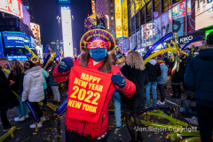 Revelers celebrate the New Year in Times Square 1/1/22.  Although the crowds were smaller, 15,000 instead of 58,000, it appeared to be a very crowded celebration.