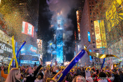 Revelers celebrate the New Year in Times Square 1/1/22.  Although the crowds were smaller, 15,000 instead of 58,000, it appeared to be a very crowded celebration.