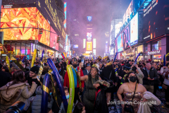 Revelers celebrate the New Year in Times Square 1/1/22.  Although the crowds were smaller, 15,000 instead of 58,000, it appeared to be a very crowded celebration.