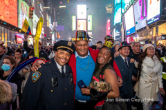 Revelers celebrate the New Year in Times Square 1/1/22.  Although the crowds were smaller, 15,000 instead of 58,000, it appeared to be a very crowded celebration.