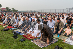 Members of the Islamic Society of Bay Ridge join in prayer at the Eid-Al-Adha celebration in Bensonhurst, Brooklyn, NY, on July 20, 2021. (Photo by Gabriele Holtermann)